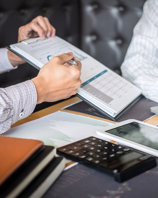 Employee explaining data on a document