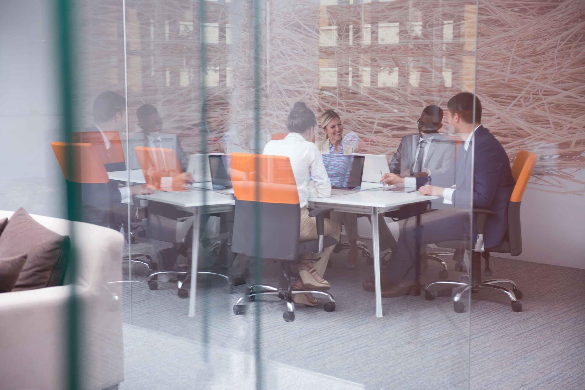 Team of employees working together during a meeting